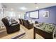 Spacious home theater with projector, screen, recliners, and foosball table at 1614 Lima Ave, Kissimmee, FL 34747