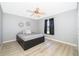 Bedroom with modern flooring, neutral gray paint, a storage bed, and natural light at 1730 Carolyn Ct, St Cloud, FL 34769