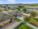 Aerial view showcasing a home with a pool and patio in a Gathering-friendly community at 2060 Patriot Way, St Cloud, FL 34769