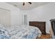 Comfortable bedroom featuring a ceiling fan and hardwood flooring at 2060 Patriot Way, St Cloud, FL 34769