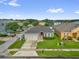Charming single-story home with well-maintained lawn and two-car garage at 2060 Patriot Way, St Cloud, FL 34769