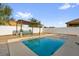 Inviting backyard pool with pergola and seating, perfect for hot summer days at 2060 Patriot Way, St Cloud, FL 34769