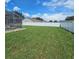 Spacious fenced backyard with a well-maintained lawn at 215 Grovepark Dr, Davenport, FL 33837