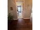 Hallway leading to bedroom with carpet flooring at 2289 Seven Oaks Dr, St Cloud, FL 34772