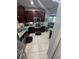 This beautiful kitchen features stainless steel appliances, granite countertops, and tile floors at 2289 Seven Oaks Dr, St Cloud, FL 34772