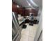 Kitchen featuring granite counters, stainless steel appliances and tile flooring at 2289 Seven Oaks Dr, St Cloud, FL 34772