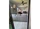 Open concept living area with neutral tones, tile floors, and access to dining at 2289 Seven Oaks Dr, St Cloud, FL 34772