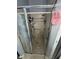 Enclosed tiled shower with adjustable shower head and safety bar at 2289 Seven Oaks Dr, St Cloud, FL 34772