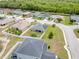 Community aerial view of the home and neighborhood, showing proximity to nearby houses at 233 E Cattail, Lake Alfred, FL 33850