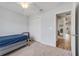 Bedroom with neutral walls, carpeted floors, ceiling fan and closet at 233 E Cattail, Lake Alfred, FL 33850