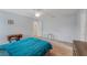 Comfortable bedroom with carpet, ceiling fan, and decor at 233 E Cattail, Lake Alfred, FL 33850