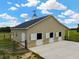 Charming barn featuring stalls with white doors and a horse weathervane at 2350 Bradbury Rd, Haines City, FL 33844