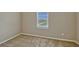 Bedroom featuring neutral carpet and a window providing natural light at 2350 Bradbury Rd, Haines City, FL 33844