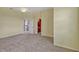 View of bedroom featuring neutral carpet and multiple entryways at 2350 Bradbury Rd, Haines City, FL 33844