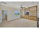 Large bonus room with built-in shelving and a window at 2350 Bradbury Rd, Haines City, FL 33844
