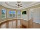 Bright bonus room with wood floors, abundant natural light, and backyard views at 2350 Bradbury Rd, Haines City, FL 33844