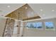 Living room featuring high ceilings, decorative paint, and a large window allowing for lots of natural light at 2350 Bradbury Rd, Haines City, FL 33844