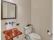 Charming powder room with unique sink, modern fixtures, and neutral tones at 2350 Bradbury Rd, Haines City, FL 33844
