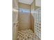 Tiled shower with a window and glass block wall provides plenty of natural light at 2350 Bradbury Rd, Haines City, FL 33844