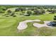 Picture of the community's attractive golf course and sand traps at 2462 Sweet Viburnum Way, Ocoee, FL 34761