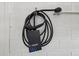 Electric vehicle charging station in the garage to support sustainable living at 2462 Sweet Viburnum Way, Ocoee, FL 34761