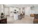 Beautiful kitchen with a center island, stainless steel appliances, and tile floors at 2462 Sweet Viburnum Way, Ocoee, FL 34761
