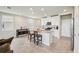 Bright kitchen featuring a center island with bar seating and recessed lighting at 2462 Sweet Viburnum Way, Ocoee, FL 34761
