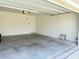 Spacious two-car garage with high ceilings and ample space for vehicles and storage at 2569 Trinidad Rd, Haines City, FL 33844