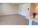 Bright living room featuring neutral tile flooring and light walls at 2569 Trinidad Rd, Haines City, FL 33844