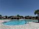 Sparkling community pool with inviting lounge areas and clear blue water offers a refreshing escape at 2569 Trinidad Rd, Haines City, FL 33844