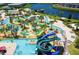 Aerial view of the community lazy river, mini golf, pool, and water slides at 2605 Scrapbook St, Kissimmee, FL 34746
