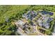 Aerial shot of community with pool, clubhouse, and apartment homes at 3175 Feltrim Pl # 101, Kissimmee, FL 34747