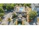 Aerial view of the clubhouse, pool, and surrounding landscaping at 3175 Feltrim Pl # 101, Kissimmee, FL 34747