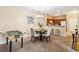 An inviting dining area is adjacent to the open kitchen, complete with a foosball table for added entertainment at 3175 Feltrim Pl # 101, Kissimmee, FL 34747