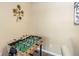 This game room features a foosball table and decorative wall art for fun and entertainment at 3175 Feltrim Pl # 101, Kissimmee, FL 34747