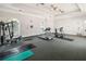 Community gym offering fitness equipment, ample space, and natural light at 3175 Feltrim Pl # 101, Kissimmee, FL 34747