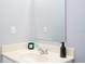 Bathroom featuring a sleek vanity with modern faucet and a large mirror at 3181 Tocoa Cir, Kissimmee, FL 34746