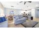 Open-concept living area with kitchen, dining, and lounge spaces for versatile living at 3181 Tocoa Cir, Kissimmee, FL 34746