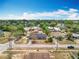 Aerial view of the neighborhood with mature trees and residential homes at 320 S Seminole Ave, Lake Alfred, FL 33850