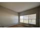 Bright and airy bedroom with large windows that let in plenty of natural light, and carpet flooring at 340 Cimarron Ct, Poinciana, FL 34759
