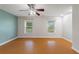 This bedroom features two windows and wood floors at 3440 La Salle Ave, St Cloud, FL 34772