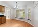 Bright dining area with lots of natural light and adjacent view to kitchen area and backyard at 3440 La Salle Ave, St Cloud, FL 34772