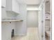 Bright laundry area features tile flooring, utility sink, ample counter space and washer/dryer hookups at 3440 La Salle Ave, St Cloud, FL 34772