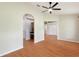 Bright, open living space with view into hallway, built in desk, and large storage closet at 3440 La Salle Ave, St Cloud, FL 34772