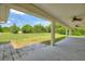 Expansive covered patio with ceiling fans providing ample space for outdoor relaxation and entertainment at 3440 La Salle Ave, St Cloud, FL 34772