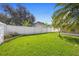 This beautifully maintained backyard features lush green grass and a privacy fence at 454 Eagle Dr, Kissimmee, FL 34759