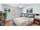 Comfortable bedroom with a cozy bed, large windows, and stylish decor at 454 Eagle Dr, Kissimmee, FL 34759