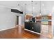 Bright kitchen features dark cabinets, granite countertops, and modern appliances at 454 Eagle Dr, Kissimmee, FL 34759