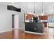 Bright kitchen features dark cabinets, granite countertops, and modern appliances at 454 Eagle Dr, Kissimmee, FL 34759