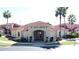 Clubhouse featuring nice landscaping and well manicured lawns situated in a residential community at 4707 Pershoie Ln, Kissimmee, FL 34746